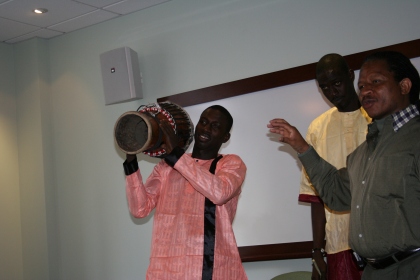Aziz and Lamine Diallo explaining the sabar drum