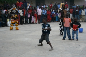 Another boy dancing to the Simb's bakk.